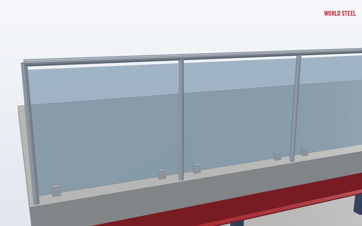 Close-up of glass infill panel held by clamps on a steel post below a top rail