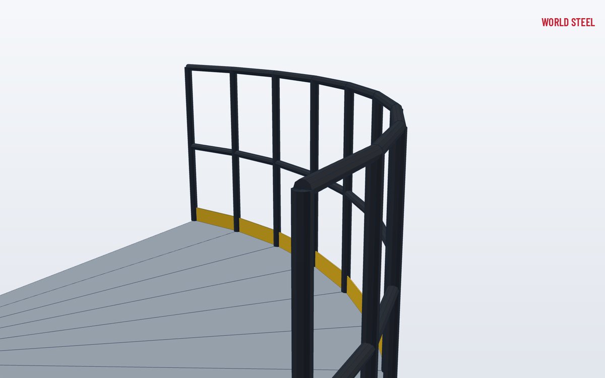 Close-up of a rolled handrail bend welded to a stanchion with a smooth ground joint