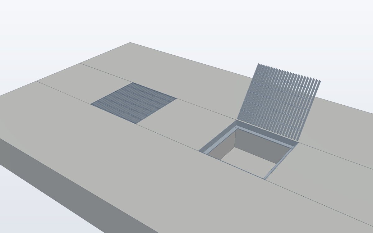Two drainage pits with grating covers
