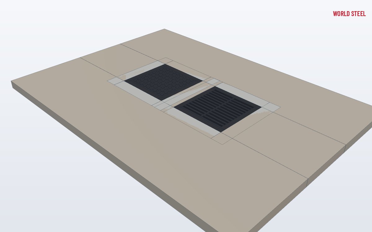 Low-angle view of ductile iron covers set in a road pavement