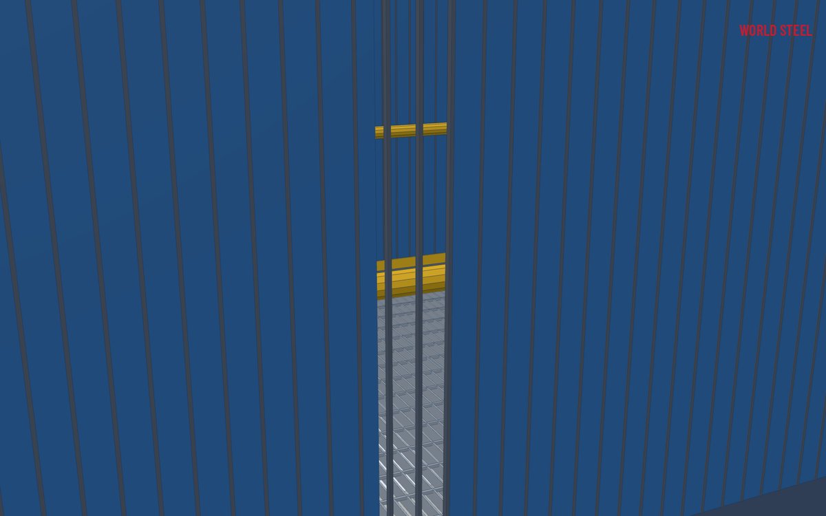 Close-up of a mesh panel frame clamped to a handrail stanchion