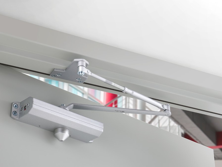 Door closer installed on a commercial door