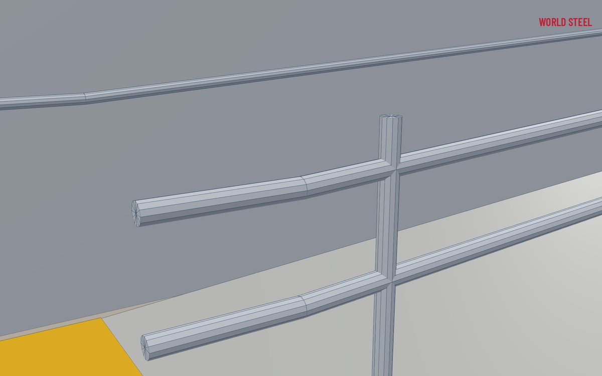 Close-up of a round handrail on a wall bracket with clearance to the wall and a returned end